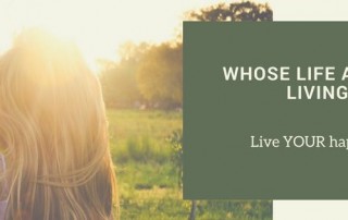 Whose life are you living podcast picture. There is a woman with long blond hair standing in a sun filled meadow. There is a caption which reads Whose Life are You Living in capital letters. Underneath in smaller letters is the text Live YOUR happy life.